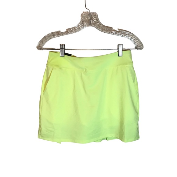 Under Armour Pants - Under armour heat gear golf skort women’s size S bright yellow UPF 30